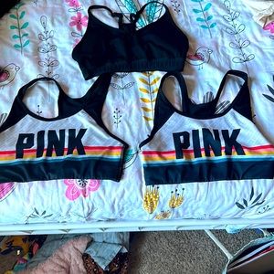 Three PINK multi color sport bras size medium good quality
